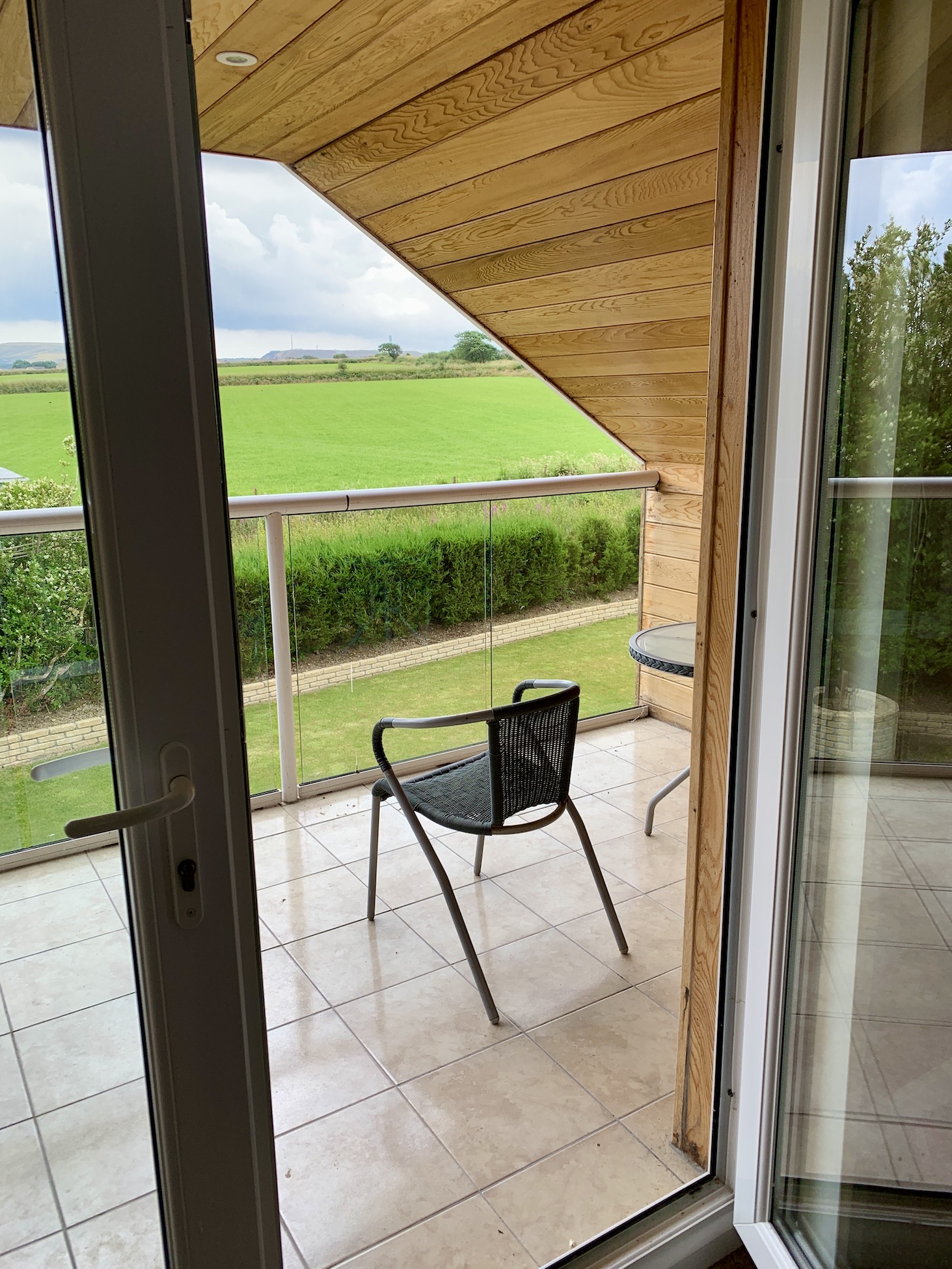 View of Countryside through Balcony Doors